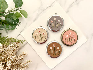 Compact Mirrors - The Mini Cosmos
